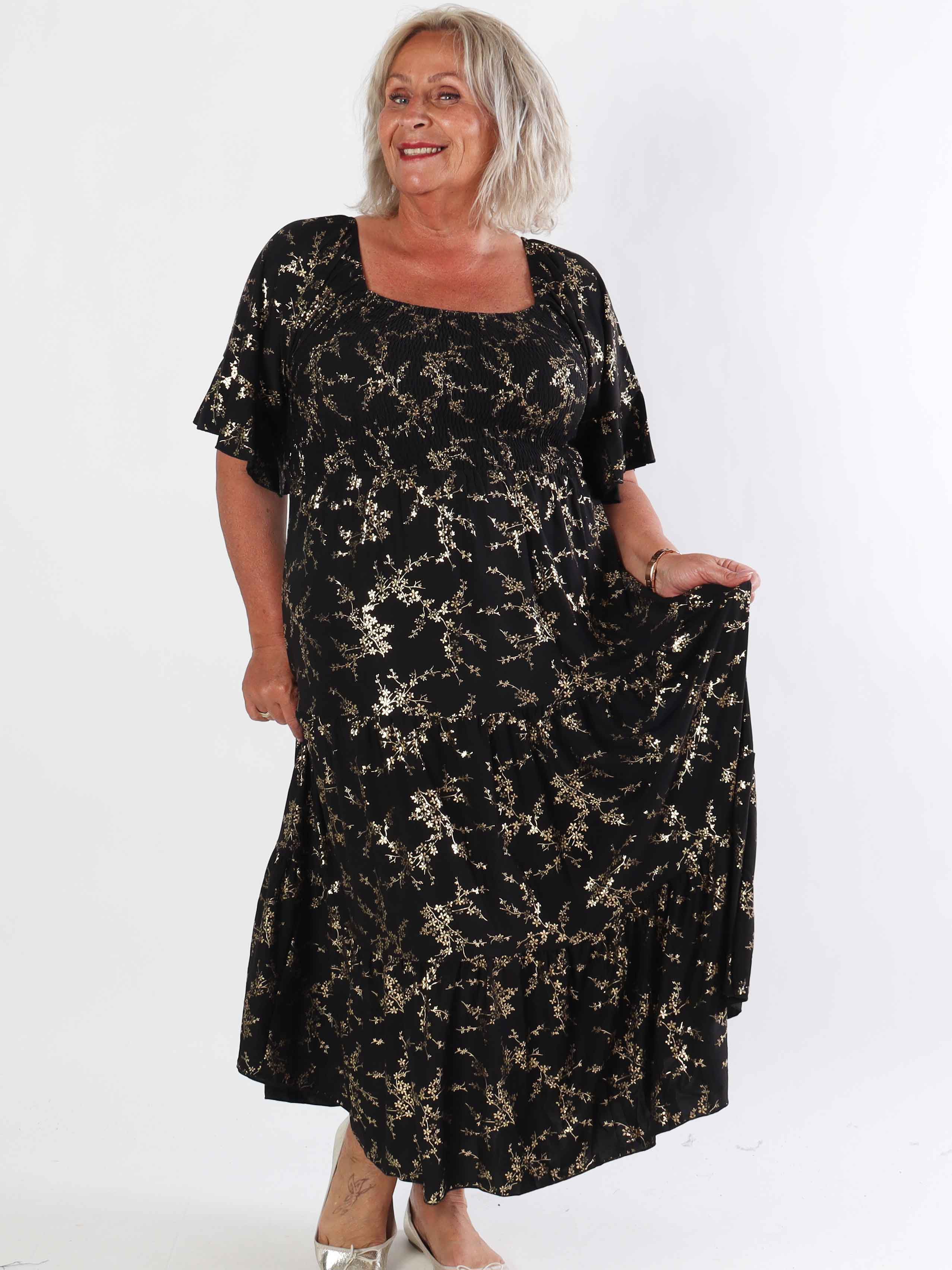 Elna Gold - Ensfarvet plus size kjole med smock og guld print